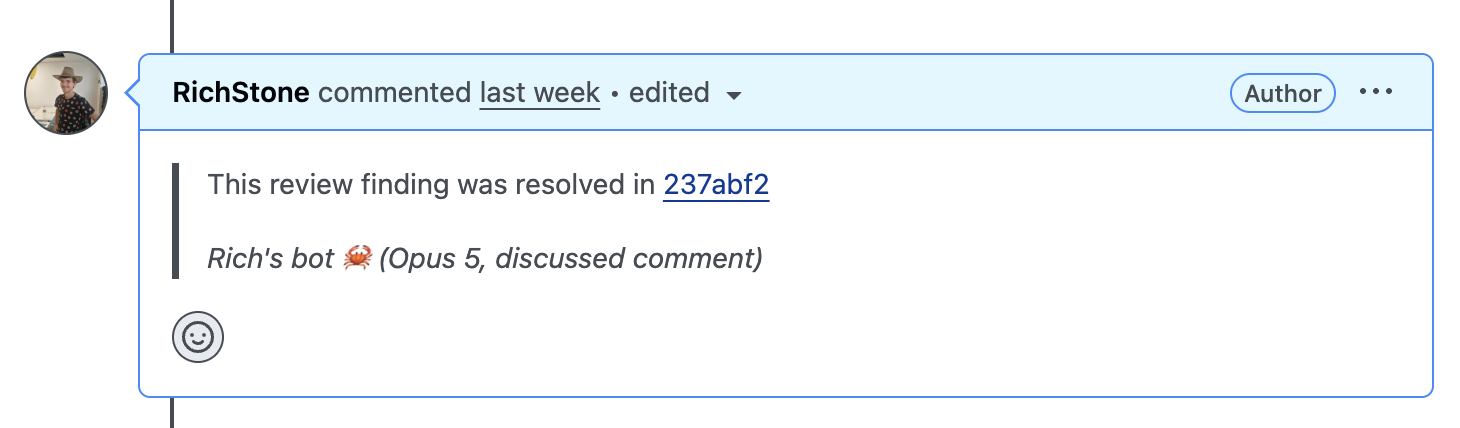 A GitHub review comment showing a resolved finding, the fixing commit, and the bot's authorship