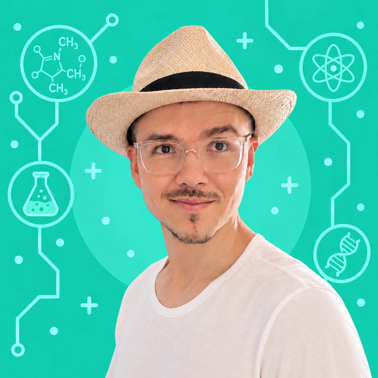 Rich Steinmetz wearing a straw hat and clear glasses.